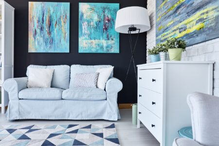Room with many paintings