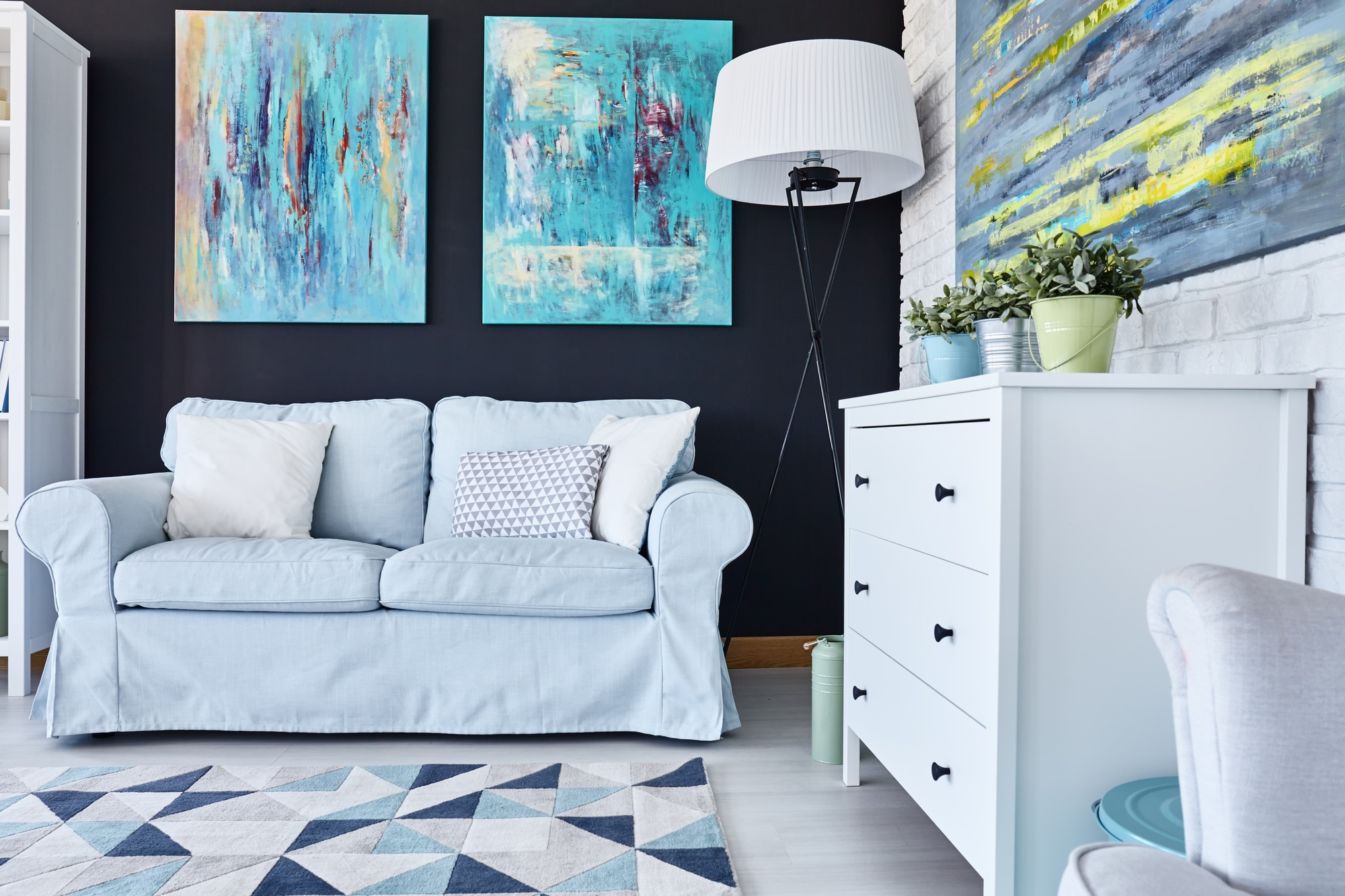 Room with many paintings